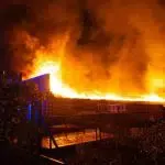 Grote brand legt ‘probleempand’  1e Industrieweg in de as